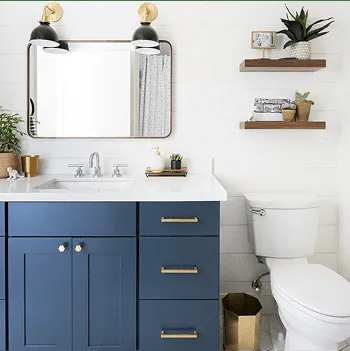 Navy shaker vanity with brass hardware