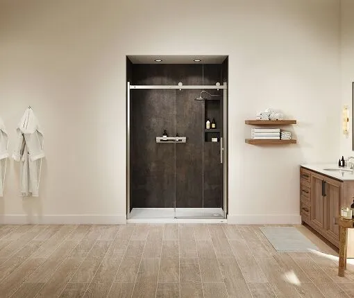 Walk-in shower with dark wall panels and glass door