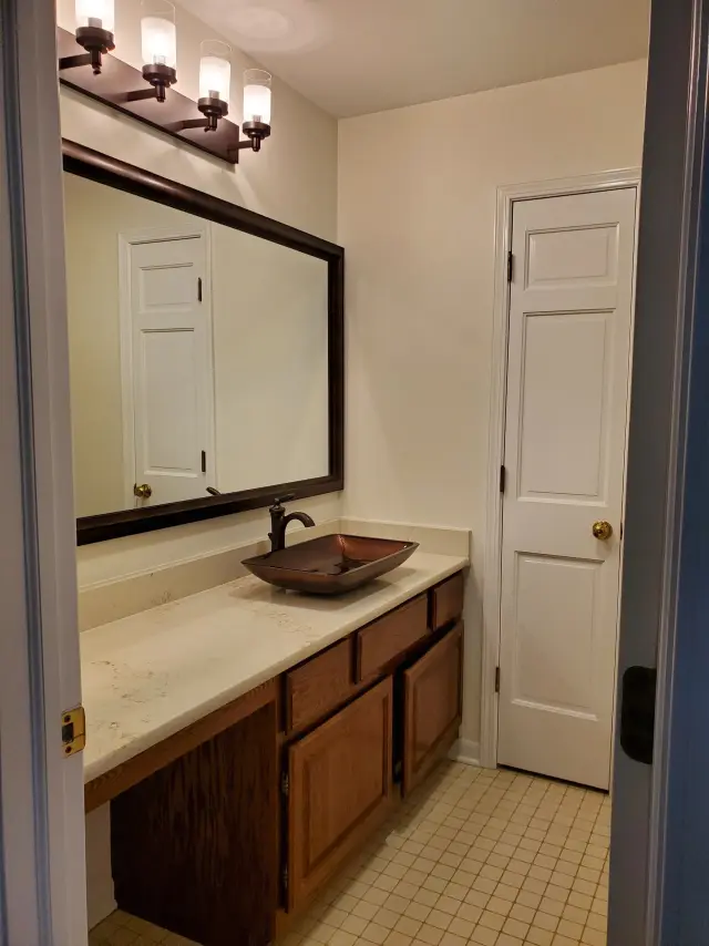 Before: small oak vanity